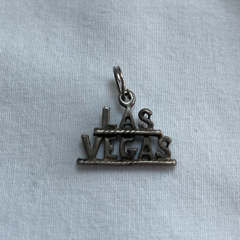 Vintage Las Vegas Sterling Silver bracelet charm. 3/8”x3/4”